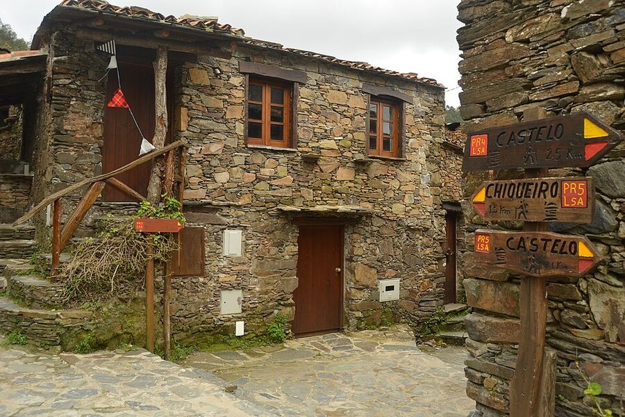 Restored schist houses on a village lane in central Portugal